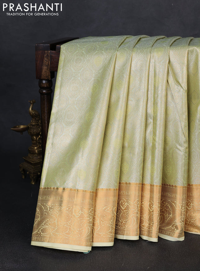 Bangalori tissue silk saree pista green and cream with allover zari woven brocade weaves and zari woven border