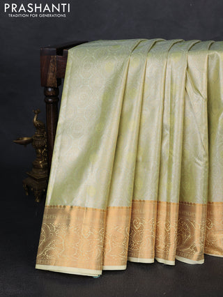 Bangalori tissue silk saree pista green and cream with allover zari woven brocade weaves and zari woven border