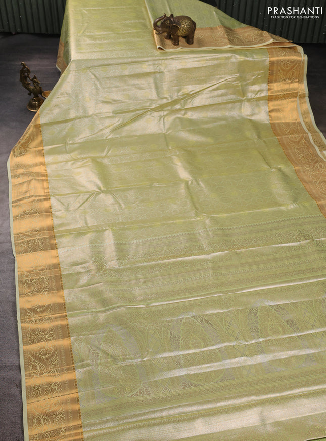 Bangalori tissue silk saree pista green and cream with allover zari woven brocade weaves and zari woven border