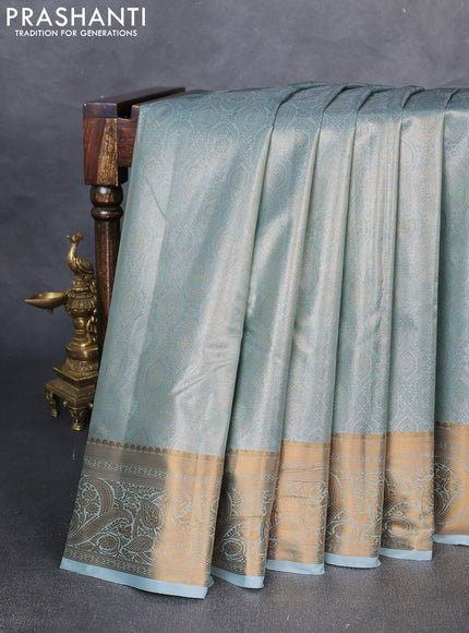 Bangalori tissue silk saree teal blue with allover zari woven brocade weaves and zari woven border