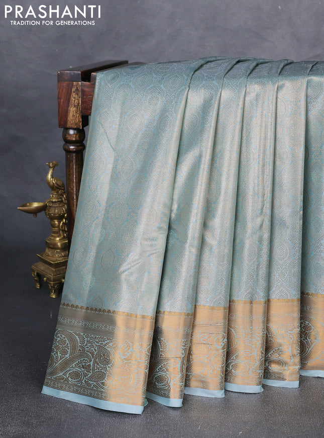 Bangalori tissue silk saree teal blue with allover zari woven brocade weaves and zari woven border