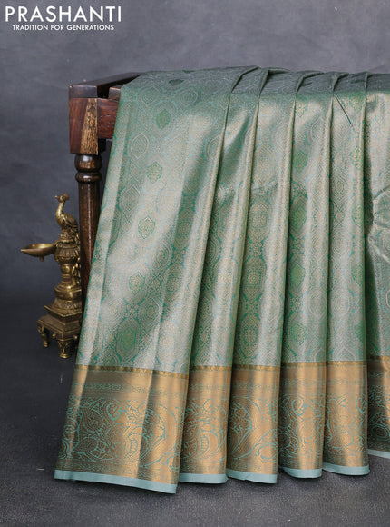 Bangalori tissue silk saree teal green with allover zari woven brocade weaves and zari woven border