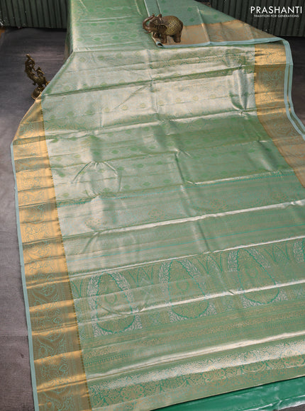 Bangalori tissue silk saree teal green with allover zari woven brocade weaves and zari woven border