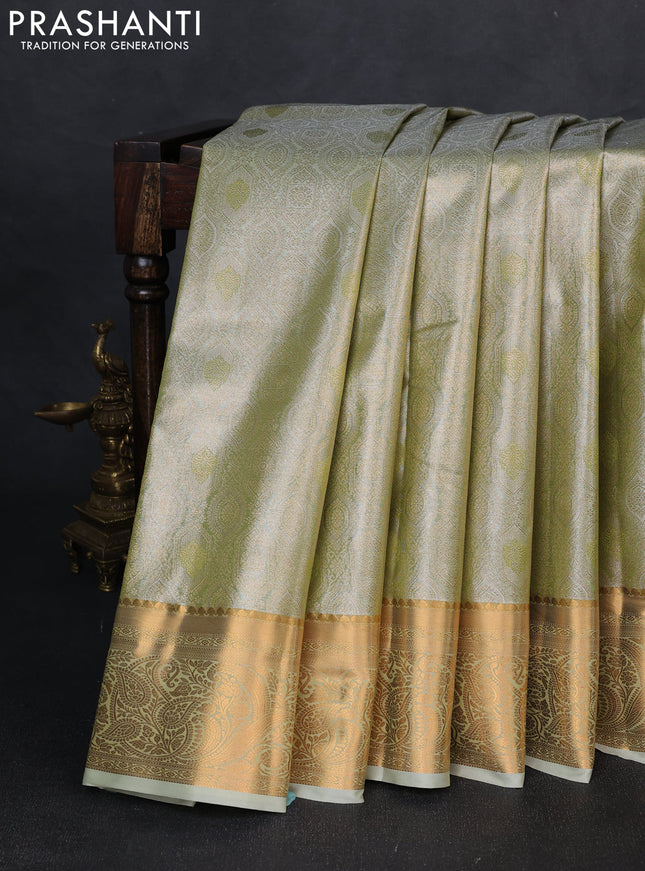 Bangalori tissue silk saree pastel green with allover zari woven brocade weaves and zari woven border