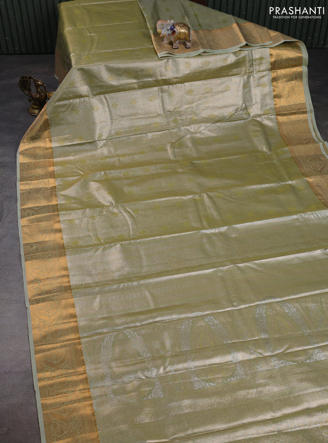 Bangalori tissue silk saree pastel green with allover zari woven brocade weaves and zari woven border