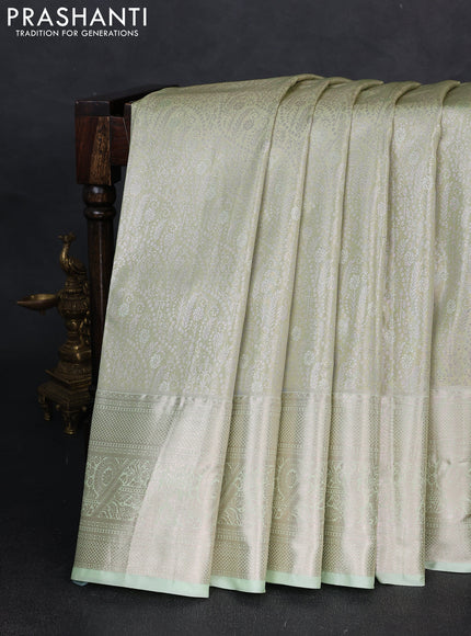 Bangalori tissue silk saree pista green with allover zari woven brocade weaves and zari woven border