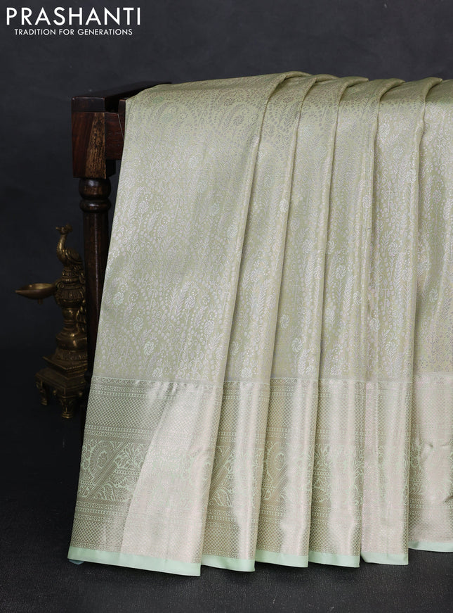 Bangalori tissue silk saree pista green with allover zari woven brocade weaves and zari woven border