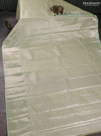 Bangalori tissue silk saree pista green with allover zari woven brocade weaves and zari woven border