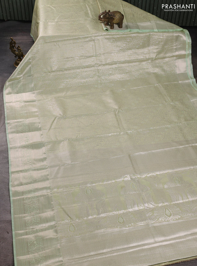 Bangalori tissue silk saree pista green with allover zari woven brocade weaves and zari woven border