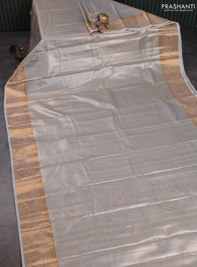 Bangalori tissue silk saree cream with allover zari woven brocade weaves and zari woven border
