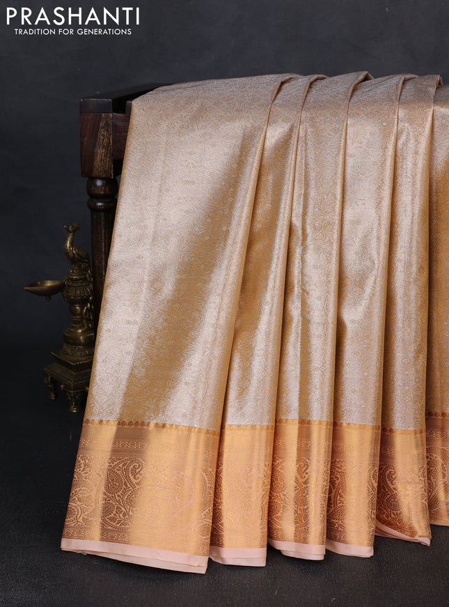 Bangalori tissue silk saree pale orange with allover zari woven brocade weaves and zari woven border