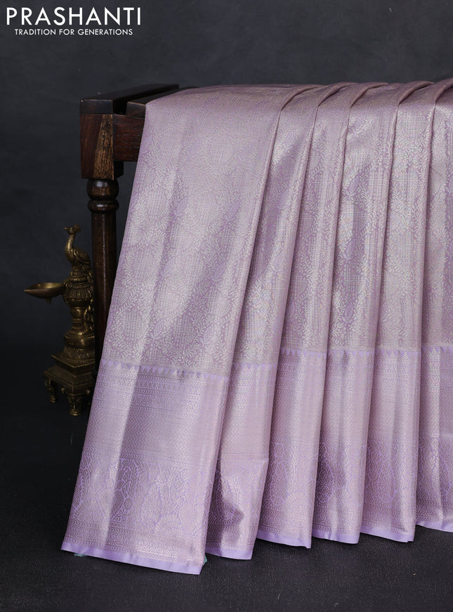 Bangalori tissue silk saree lavender with allover zari woven brocade weaves and long zari woven border
