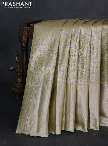 Bangalori tissue silk saree elaichi green with allover zari woven brocade weaves and long zari woven border