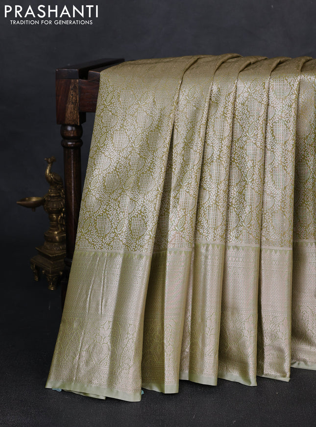 Bangalori tissue silk saree elaichi green with allover zari woven brocade weaves and long zari woven border