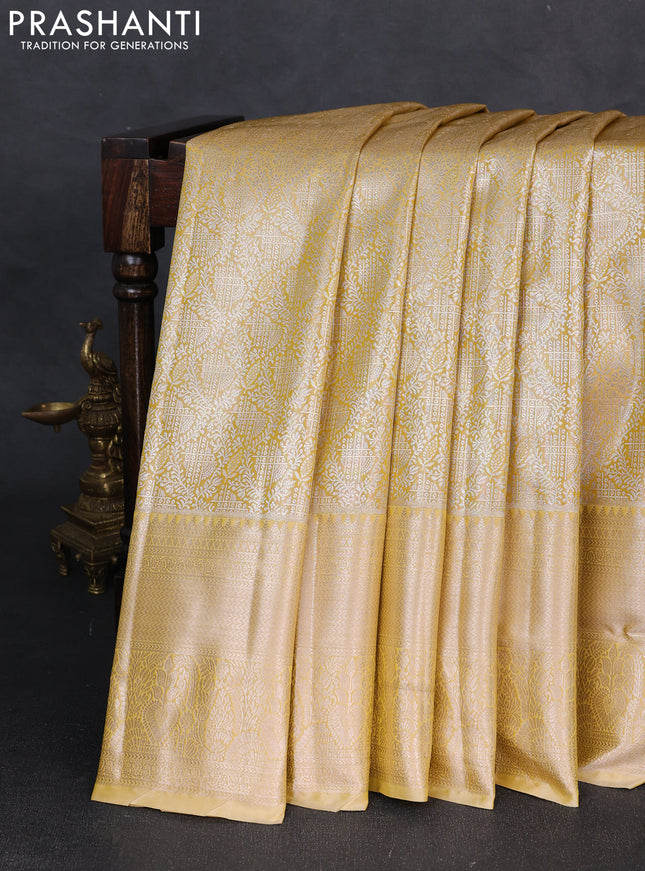 Bangalori tissue silk saree mustard yellow with allover zari woven brocade weaves and long zari woven border