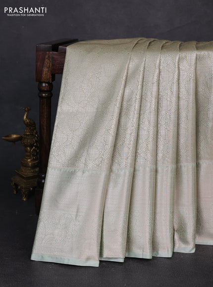 Bangalori tissue silk saree pista green with allover zari woven brocade weaves and long zari woven border