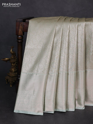 Bangalori tissue silk saree pista green with allover zari woven brocade weaves and long zari woven border