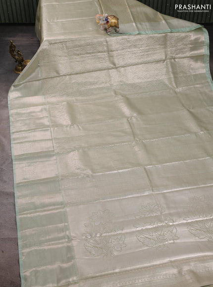 Bangalori tissue silk saree pista green with allover zari woven brocade weaves and long zari woven border
