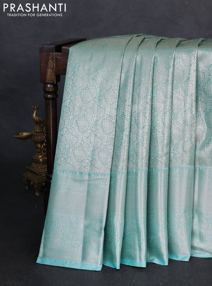 Bangalori tissue silk saree teal green with allover zari woven brocade weaves and zari woven border