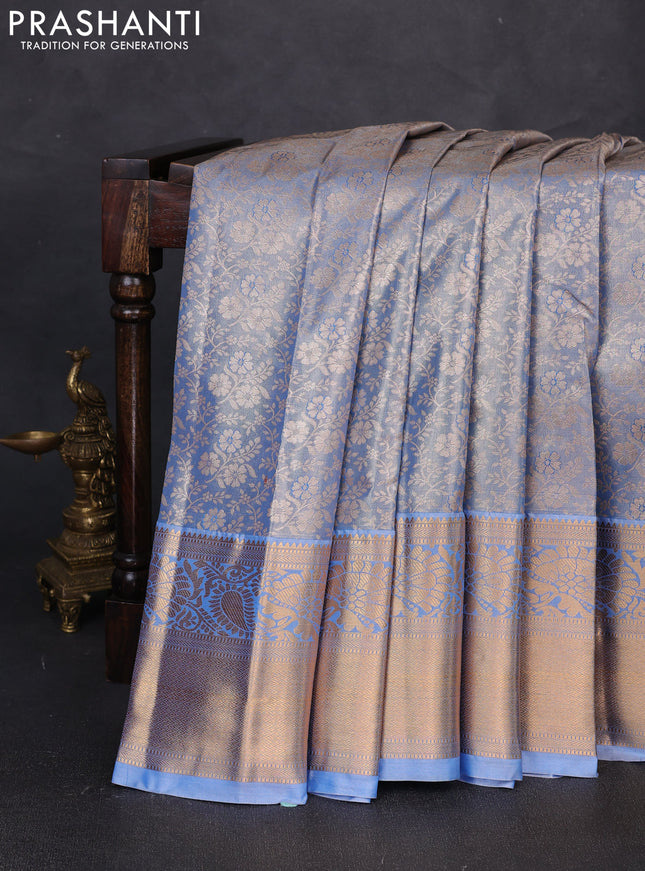 Bangalori tissue silk saree pastel blue with allover zari woven brocade weaves and long zari woven border