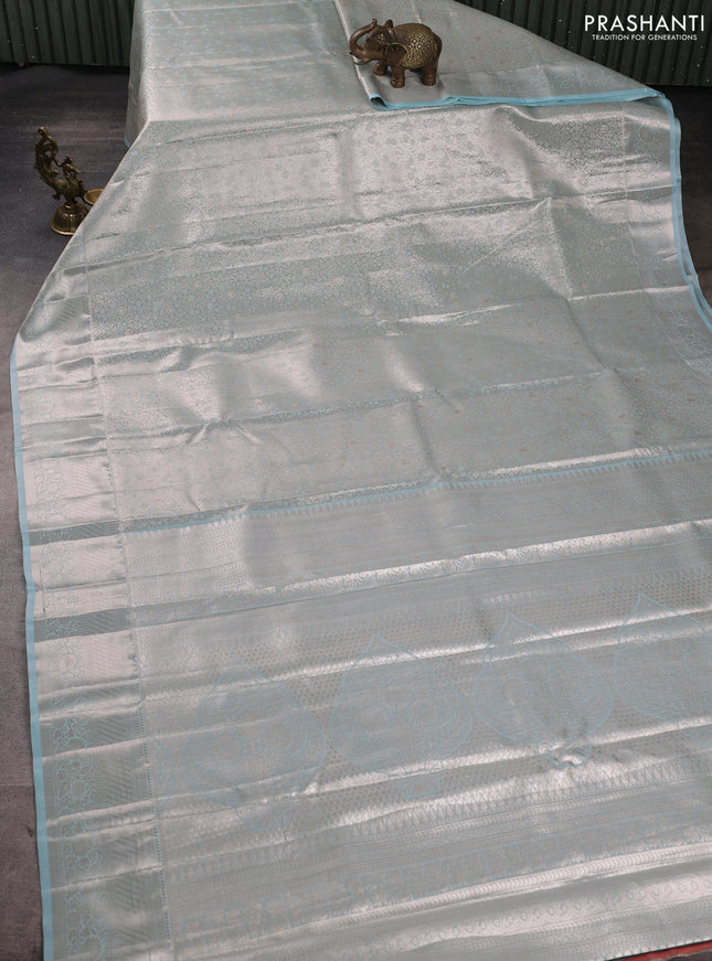 Bangalori tissue silk saree teal blue with allover zari woven brocade weaves and zari woven border