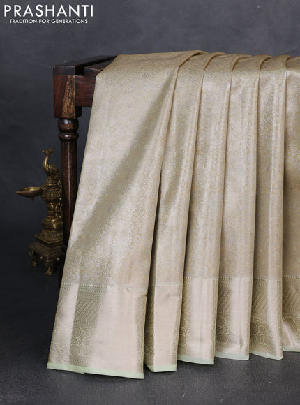 Bangalori tissue silk saree pista green with allover zari woven brocade weaves and zari woven border
