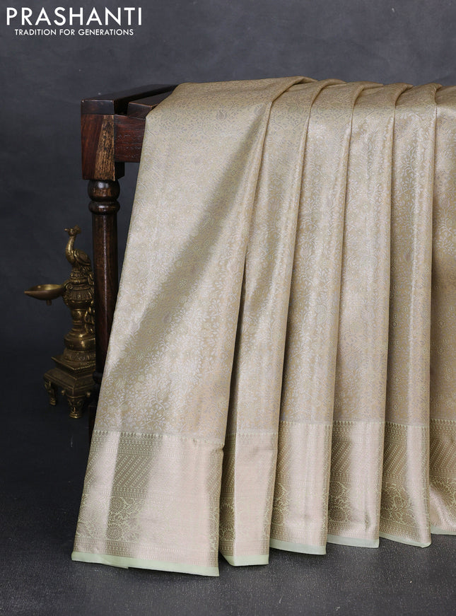 Bangalori tissue silk saree pista green with allover zari woven brocade weaves and zari woven border