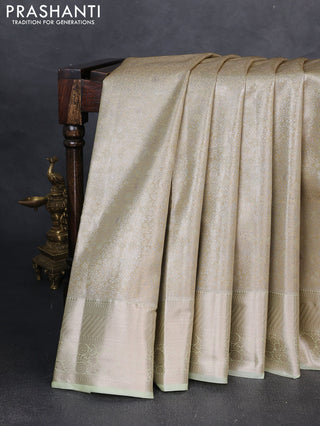 Bangalori tissue silk saree pista green with allover zari woven brocade weaves and zari woven border