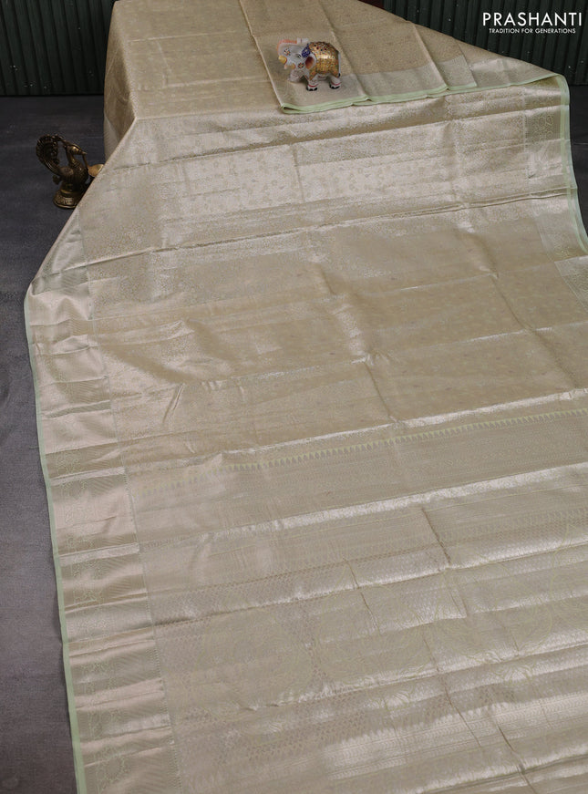 Bangalori tissue silk saree pista green with allover zari woven brocade weaves and zari woven border