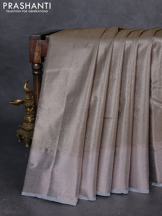 Bangalori tissue silk saree pastel blue with allover zari woven brocade weaves and zari woven border
