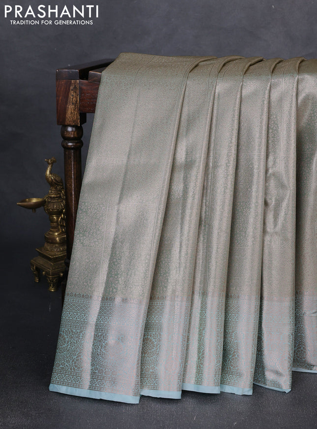 Bangalori tissue silk saree teal blue with allover zari woven brocade weaves and zari woven border