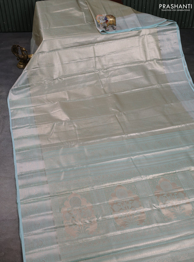 Bangalori tissue silk saree teal blue with allover zari woven brocade weaves and zari woven border