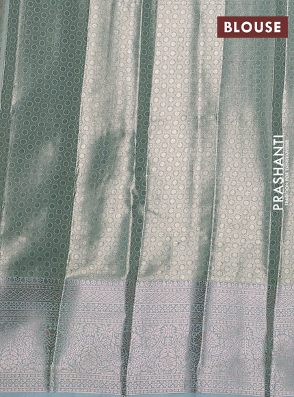 Bangalori tissue silk saree teal blue with allover zari woven brocade weaves and zari woven border