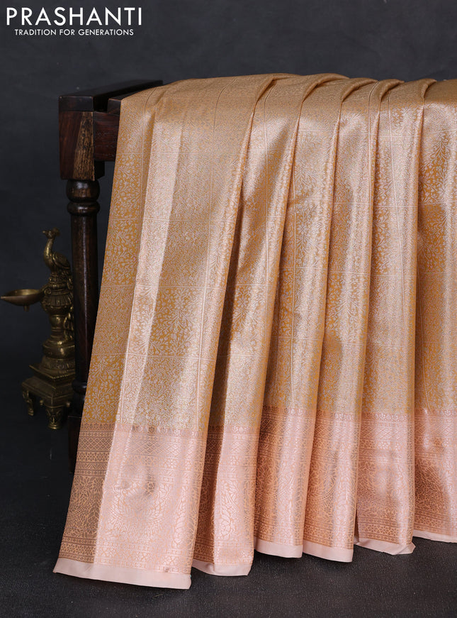Bangalori tissue silk saree peach shade with allover zari woven brocade weaves and zari woven border