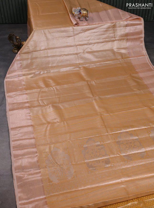 Bangalori tissue silk saree peach shade with allover zari woven brocade weaves and zari woven border