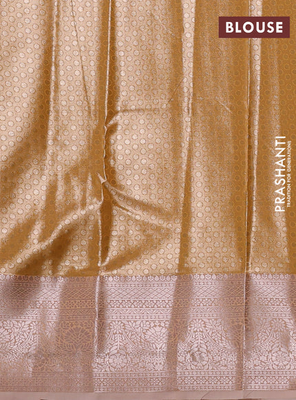 Bangalori tissue silk saree peach shade with allover zari woven brocade weaves and zari woven border