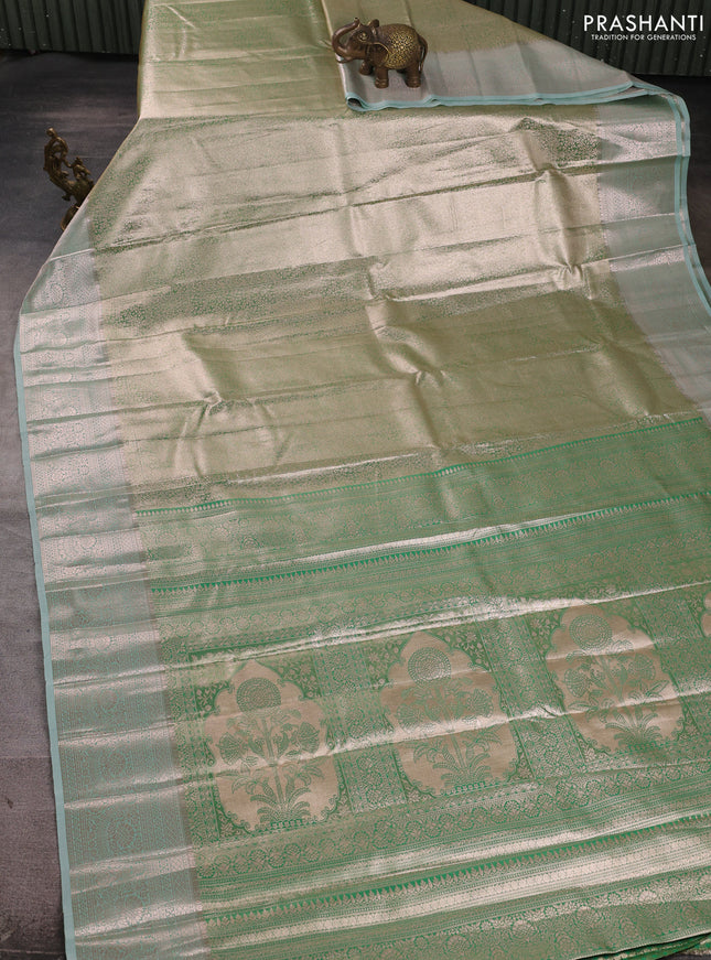 Bangalori tissue silk saree teal green with allover zari woven brocade weaves and zari woven border