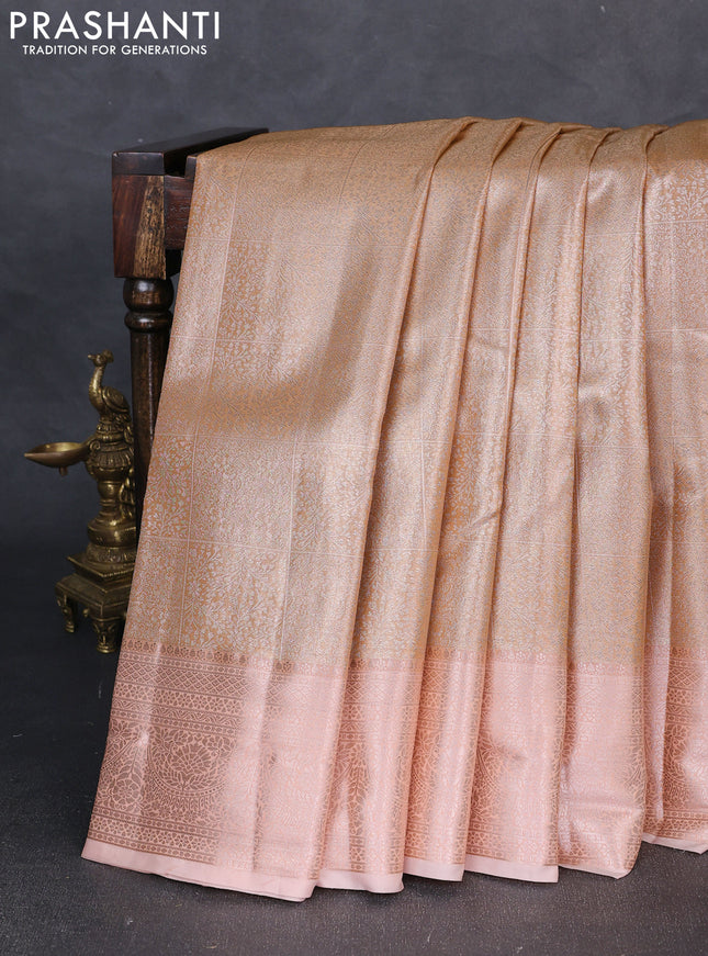 Bangalori tissue silk saree peach shade with allover zari woven brocade weaves and zari woven border