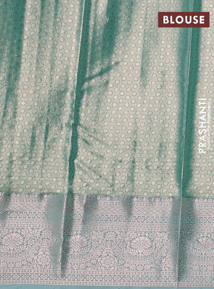Bangalori tissue silk saree teal green with allover zari woven brocade weaves and zari woven border