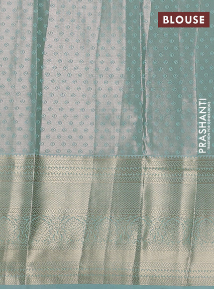 Bangalori tissue silk saree teal green with allover zari woven brocade weaves and long zari woven border