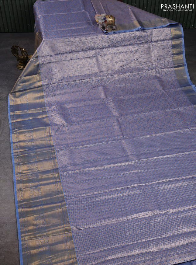 Bangalori tissue silk saree blue with allover zari woven brocade weaves and long zari woven border