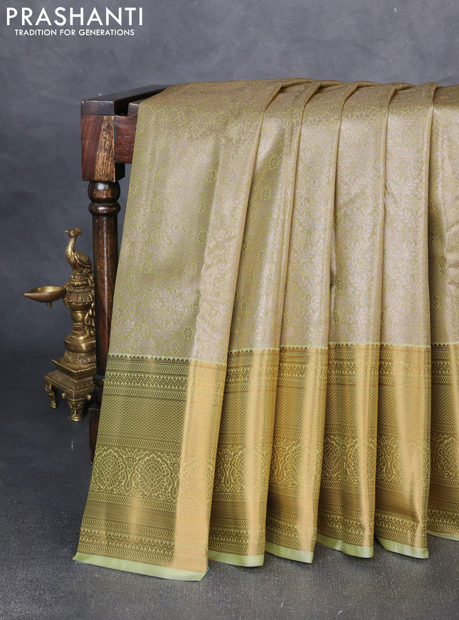 Bangalori tissue silk saree mild pista green with allover zari woven brocade weaves and zari woven border