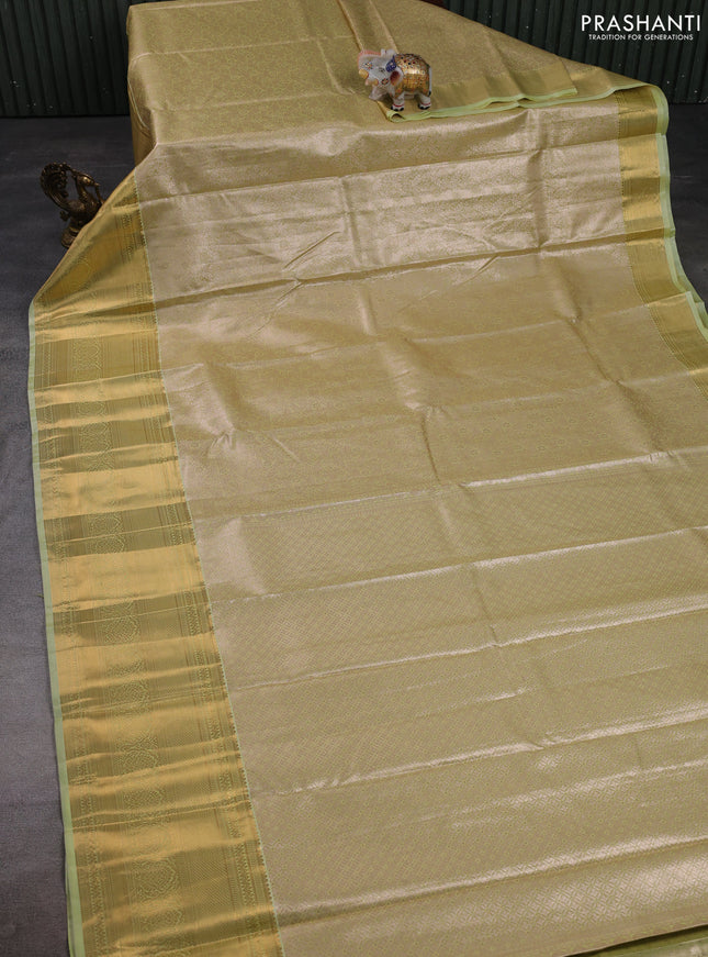 Bangalori tissue silk saree mild pista green with allover zari woven brocade weaves and zari woven border