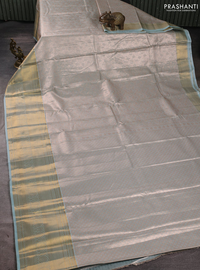 Bangalori tissue silk saree teal blue with allover zari woven brocade weaves and long zari woven border