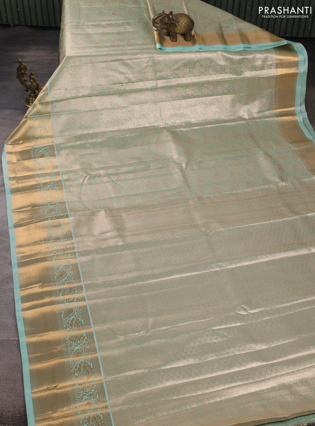 Bangalori tissue silk saree teal green with allover zari woven brocade weaves and long zari woven border