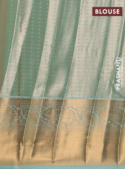 Bangalori tissue silk saree teal green with allover zari woven brocade weaves and long zari woven border