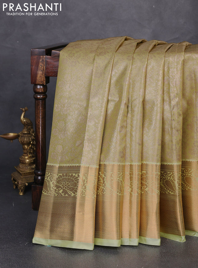 Bangalori tissue silk saree pista green with allover zari woven brocade weaves and long zari woven border