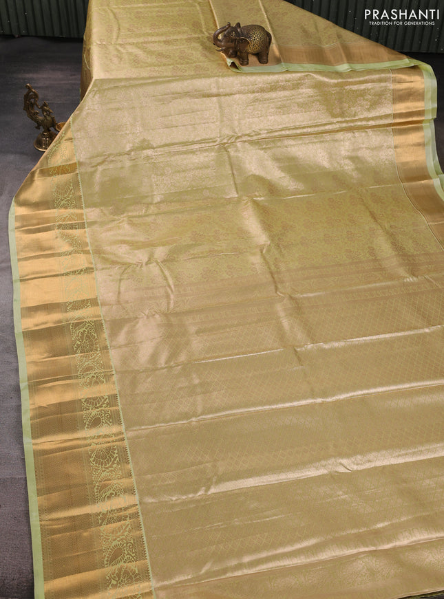Bangalori tissue silk saree pista green with allover zari woven brocade weaves and long zari woven border