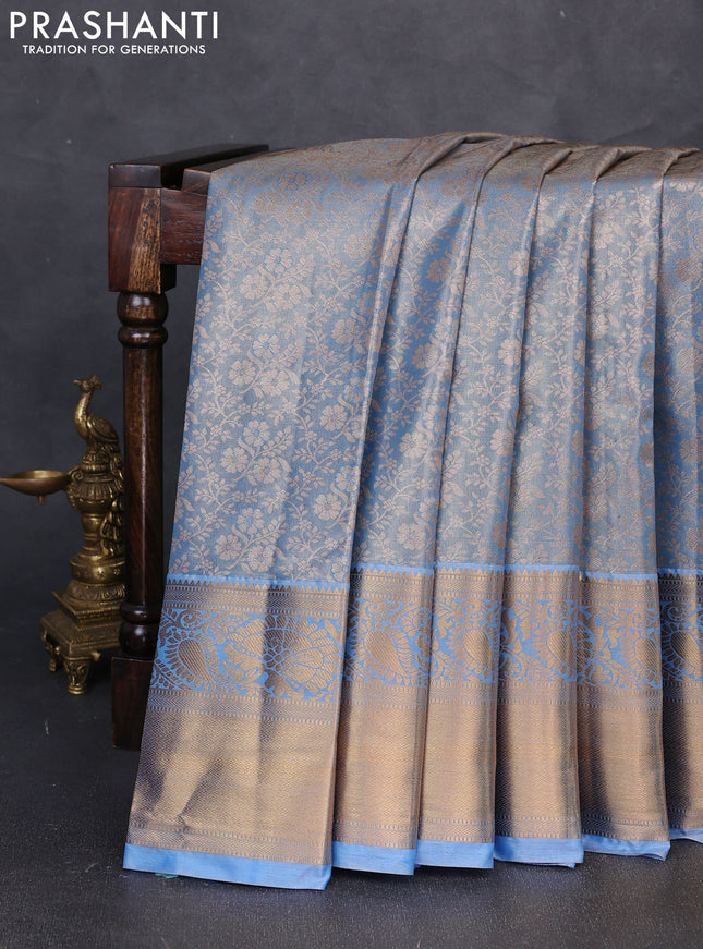 Bangalori tissue silk saree pastel blue with allover zari woven brocade weaves and long zari woven border