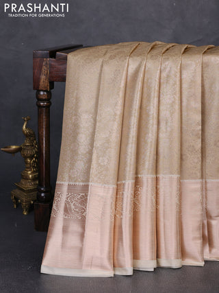 Bangalori tissue silk saree cream with allover zari woven brocade weaves and long zari woven border